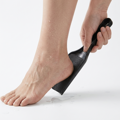 Ergonomisk fotfil med böjd design för hälvård